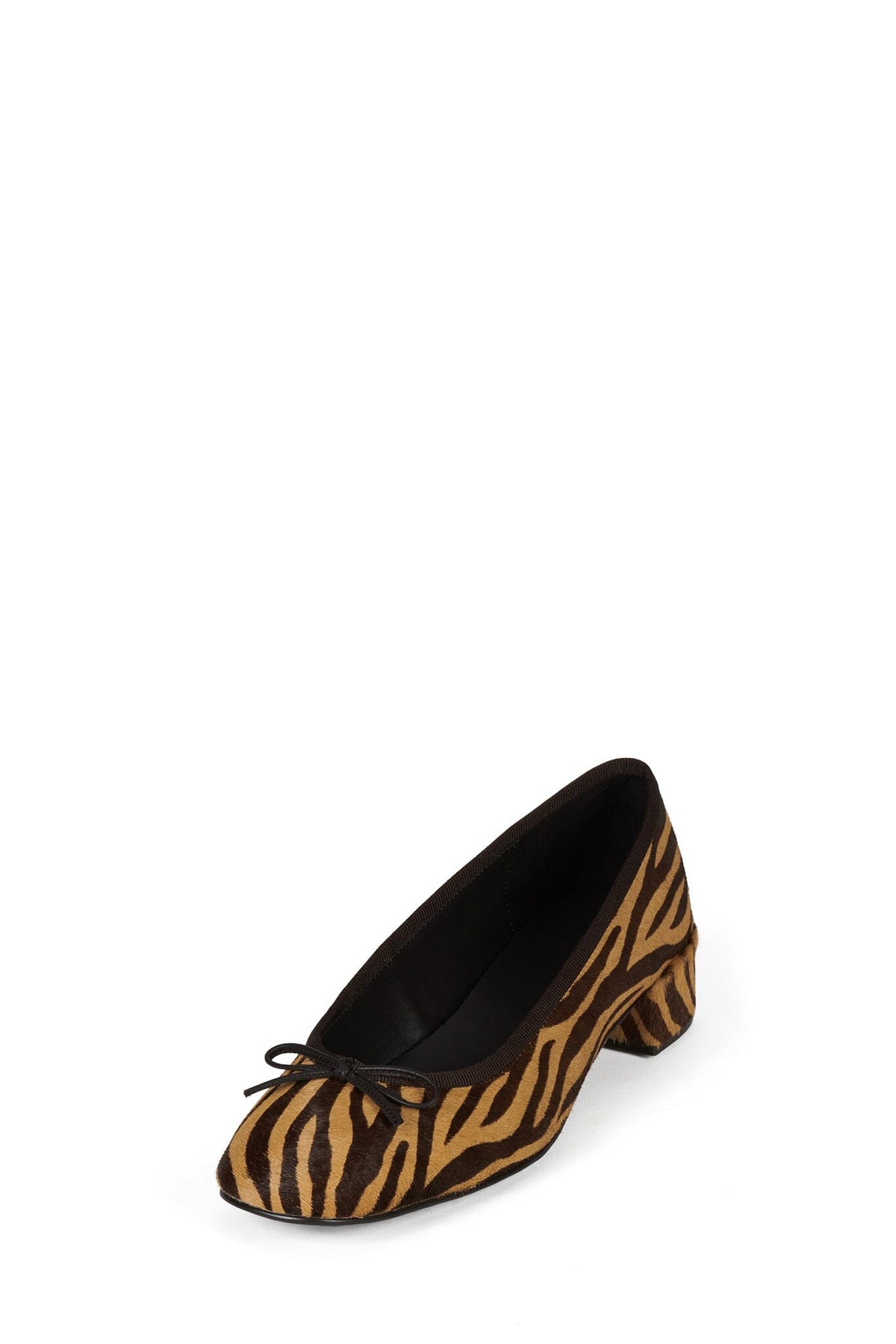Black and tan zebra print pump with a low curved heel rounded square toe and gathered vamp detail