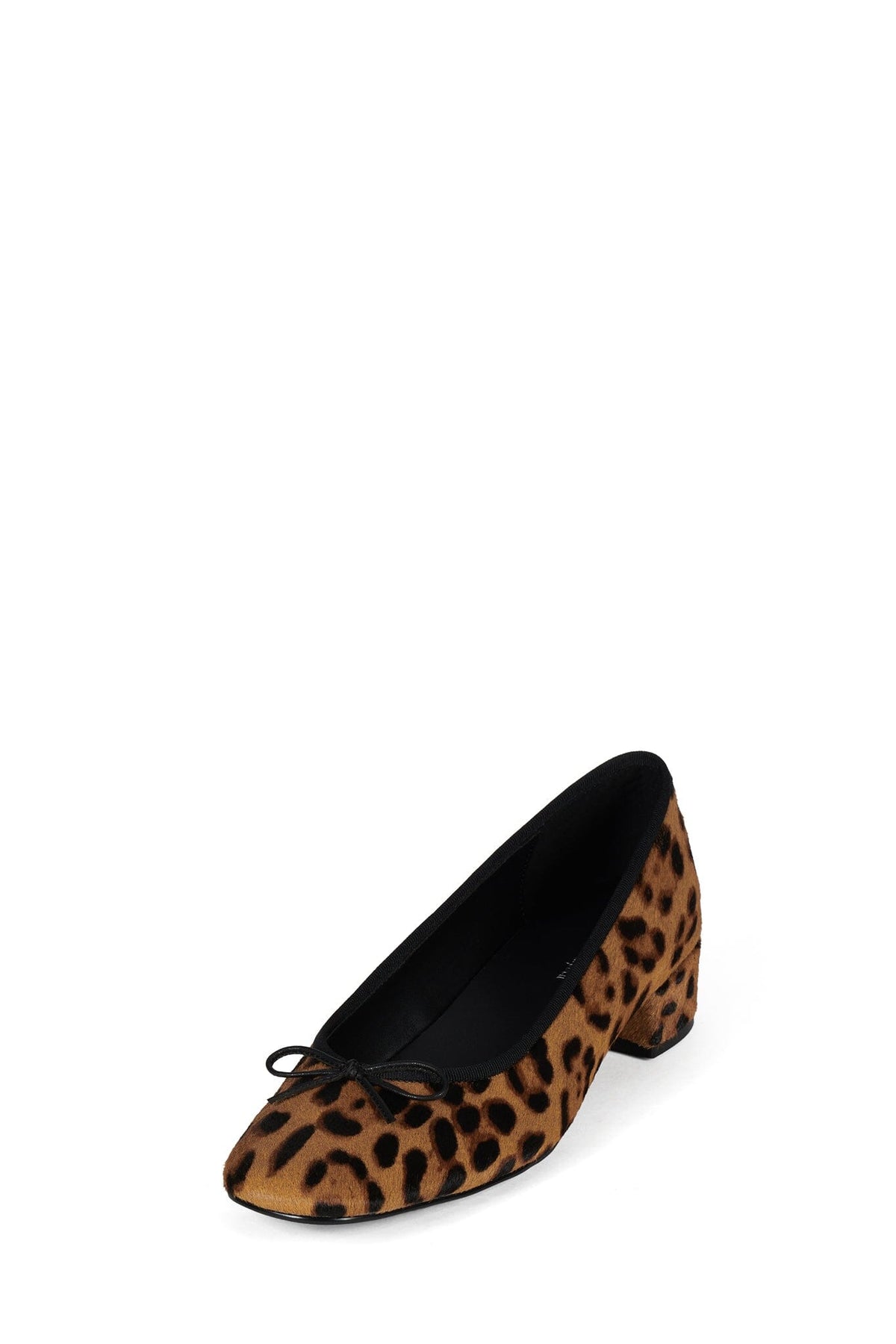 Leopard print pointed toe pump with black trim and a low angular block heel